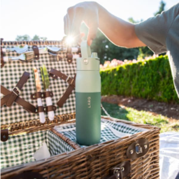 Photo of LARQ Bottle Swig Top - Eucalyptus Green in picnic basket